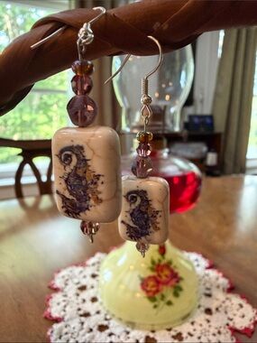 Handmade White Ceramic Seahorse Earrings with Purple Accents